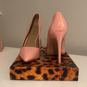 Lemonade pink patent leather heels.